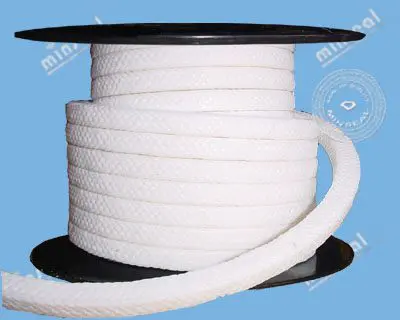 A spool of thick, white braided rope against a blue background.