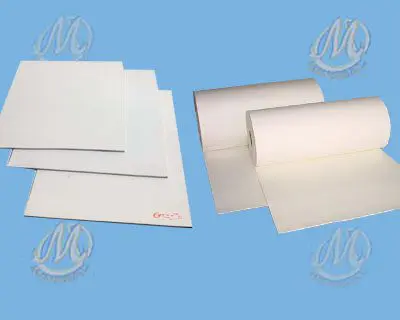 Sheets of white paper are displayed on a blue background, with some lying flat and others rolled up.