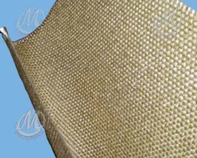 Close-up of a textured, fabric-like material with a repeating pattern, set against a blue background.