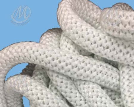 Close-up of a coiled, white braided rope against a light blue background.