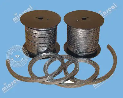 Two spools of braided packing material with several cut rings displayed in front, set against a blue background.