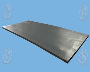A sheet of metal sitting on top of a table.