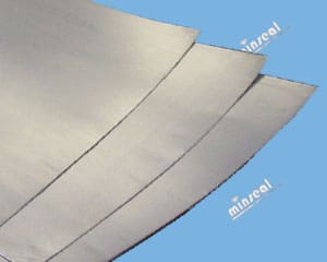 Three sheets of grey material overlapping.