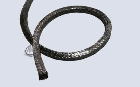 Black braided packing on light background.
